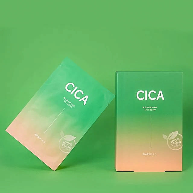 Box of Barulab Clean Vegan Cica Mask Sheets with a single mask package leaning against the box, showing the product packaging and design.