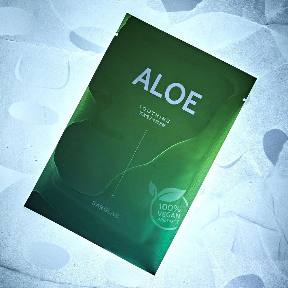 Close-up of Barulab Clean Vegan Aloe Mask Sheet out of packaging, showing the sheet mask texture and size.